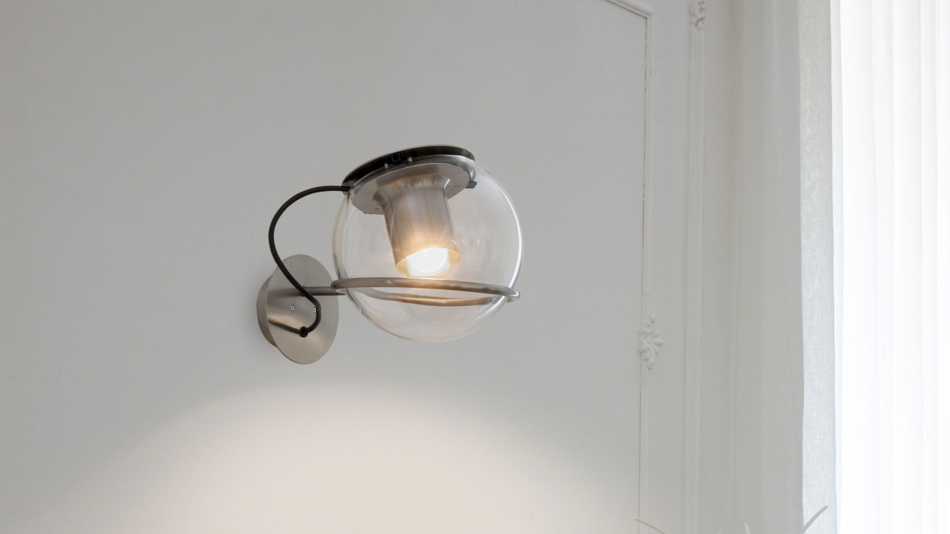 The Globe Wall Lamp by Oluce Lamps